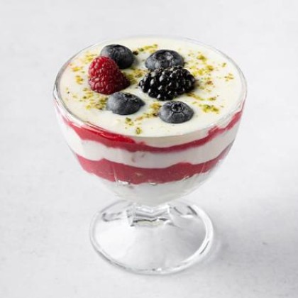 Yoghurt with homemade granola, raspberry puree and apricot